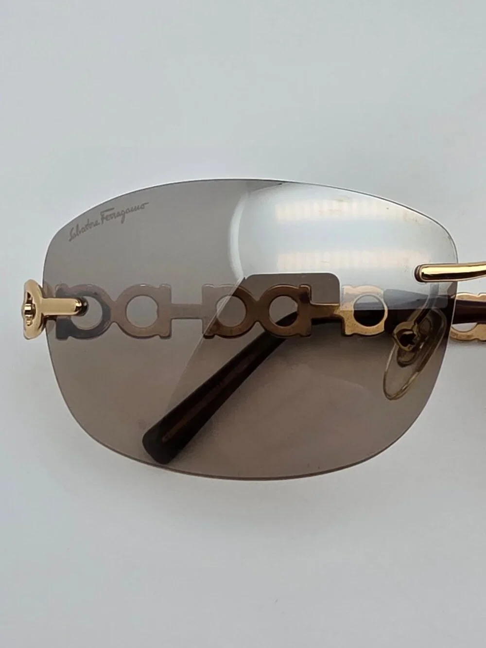 Salvatore Ferragamo 1055 Gold Gancini Frame Gold Mirror Rimless Sunglasses 61mm